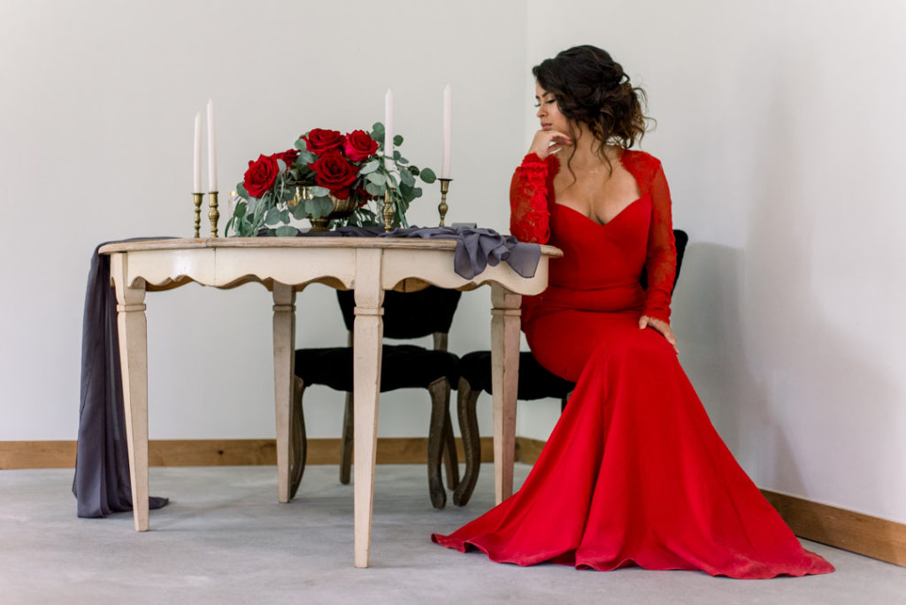 bride, red wedding gow, red rose, tablescape, reception table, vintage rentals