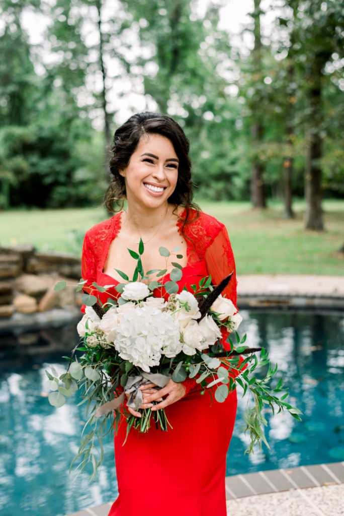 Bride, Red wedding Gown, White florals
